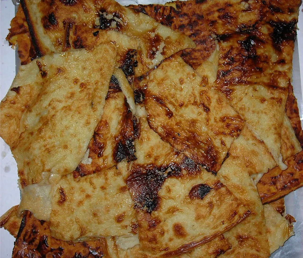 La farinata bianca di Savona, la specialità di Vino e Farinata
